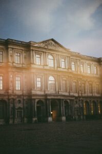 Film photo of a historic building with motion blur