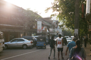 Film photo of a vivid street during golden hour in Kandy, Sri Lanka