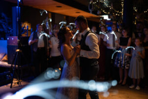 Calm and atmospheric photo of the wedding dance in low light