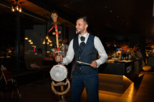 The groom plays a unique instrument on the dance floor
