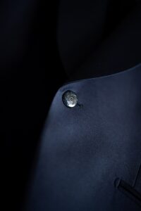 Close-up of a suit button