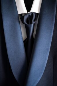 Close-up of the groom's suit and tie