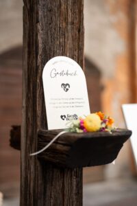 Close-up of the instructions and description for the wedding guest book