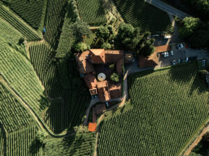 Drone photo of Schloss Rametz surrounded by vineyards and Mediterranean charm