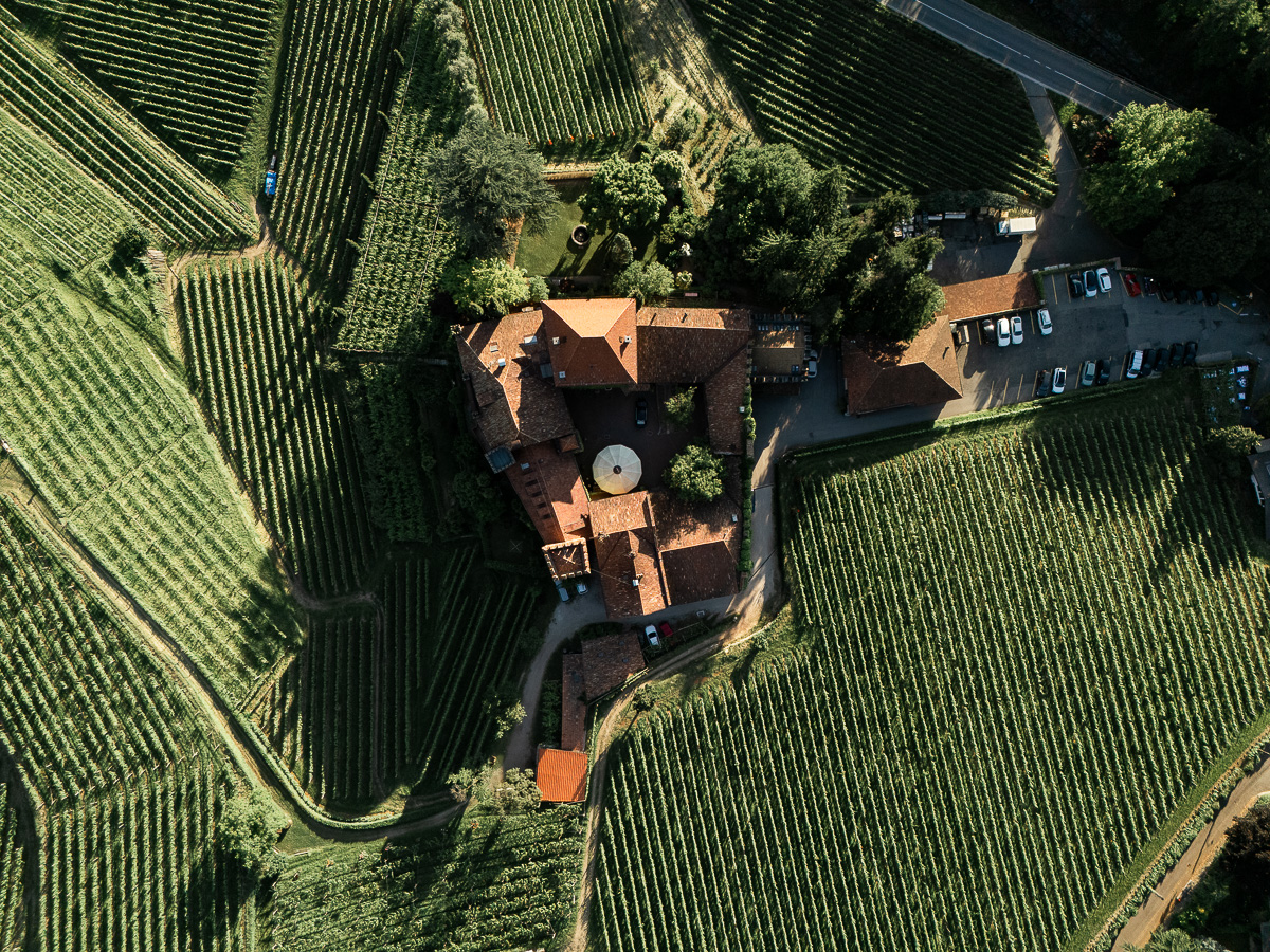 Drone photo of Schloss Rametz surrounded by vineyards and Mediterranean charm