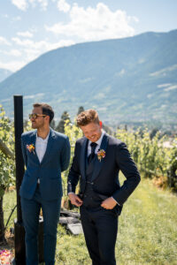 Groom and best man standing at the front of the ceremony location
