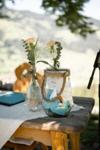Detail photo of a vase filled with guests’ wishes