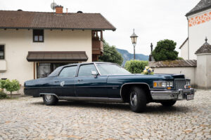Vintage Cadillac photographed from a low-angle perspective.