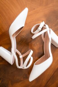 Detail shot of the bride’s shoes photographed from above
