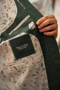 Close-up of the suit lining embroidered with names and wedding date