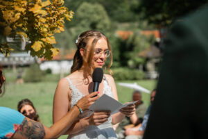 The bride reads her wedding vows to the groom
