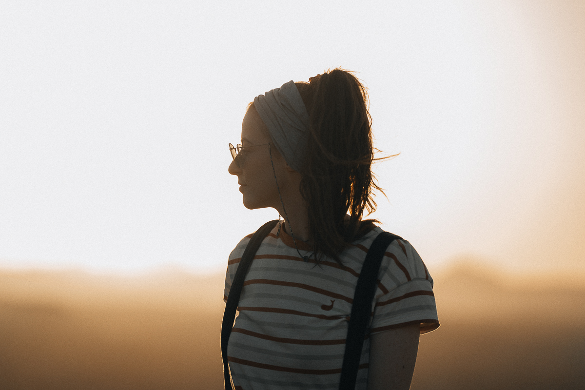 Silhouette photo of Caro at sunset in nature