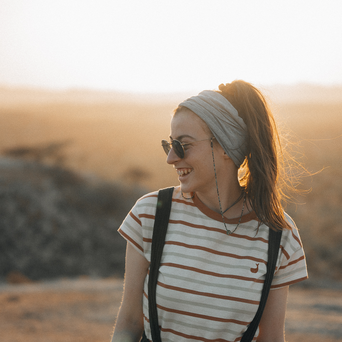 Portrait of Caro at sunset in the nature of Rajasthan, India
